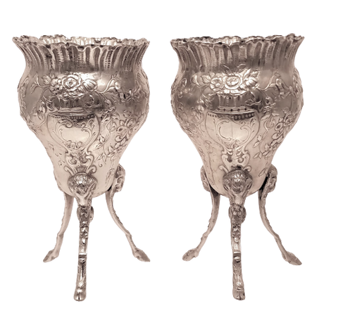 Pair of Silver Footed Vases With Flowers and Bows